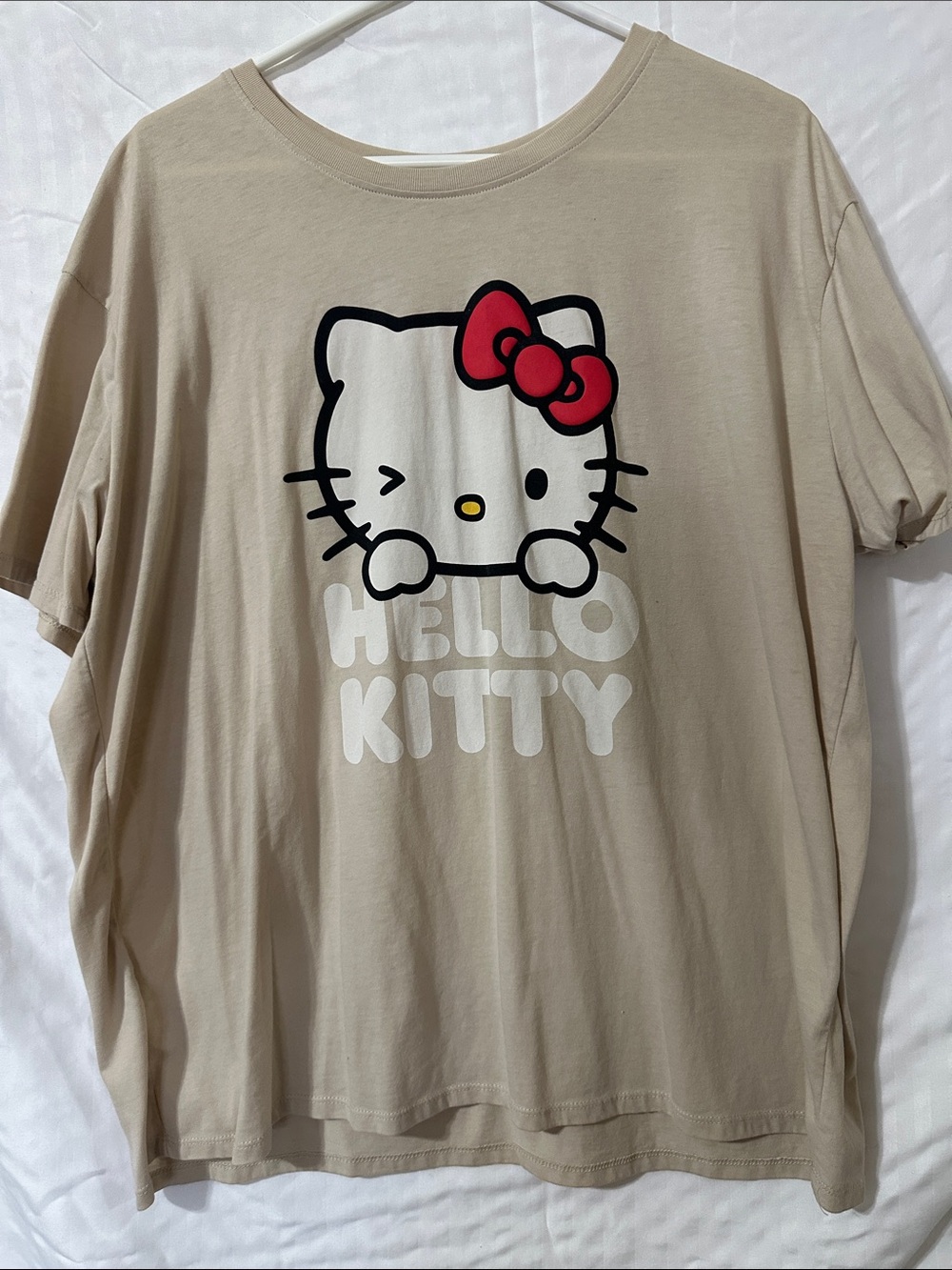 Hello Kitty Beige Tee with Red Bow Graphic